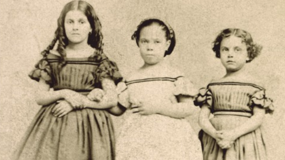 1863 albumen print, carte-de-visite: 'Rebecca, Augusta and Rosa. Slave Children from New Orleans'. Image courtesy of George Eastman Museum.
