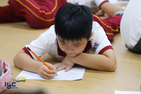 An IGC student working on their activities